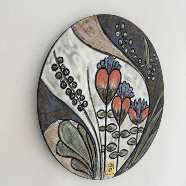 Handmade Ceramic Floral Wall Plate from Ruscha, Germany, 1970s, in Good conditions. Designed 1970 to 1979 This piece has...