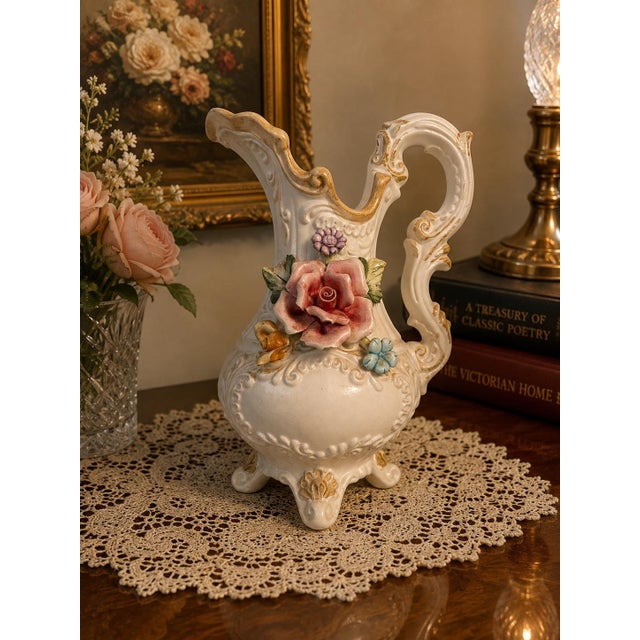 Beautiful vintage Capodimonte porcelain ewer/pitcher made in Italy, featuring an ornate sculptural form with raised...