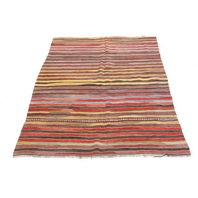 Handwoven vintage striped kilim rug from Denizli region of Turkey. Approximatelly 45-55 years old. In very good condition.