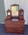 This exquisite chest of drawers or vanity is a beautiful find with solid mahogany construction in a Victorian Eastlake...