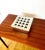 Vintage chrome-plated metal table ashtray with a bold geometric design, its textured construction lending it a truly...