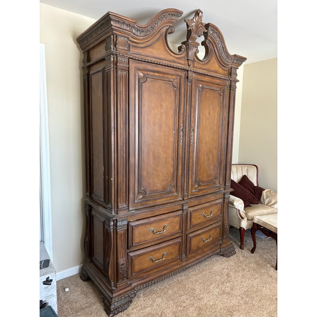 Marge Carson Bellagio Armoire. Complete bedroom set also being sold separately (King sized bedframe, dresser w/marble top...