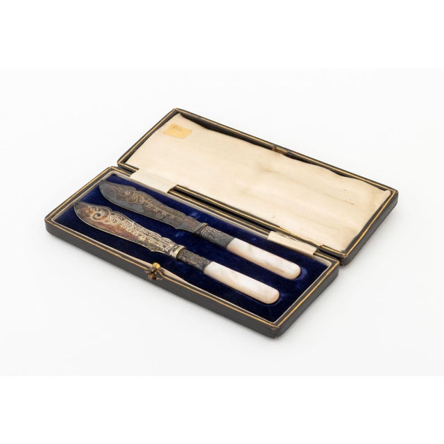 Pair of Victorian Silver Plate and Mother-of-Pearl Fish Knives, late 19th century, each marked "JS / S / EP" to blade,...