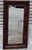 Beautiful mid-19th century American Empire ogee wall mirror, circa 1840–1860. Crafted with a figured mahogany veneer frame...