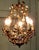 French Toleware Gilt and Ceramic Flower 5 Bulb Chandelier This French Hand made Gilt and Ceramic Chandelier is lit by 5...