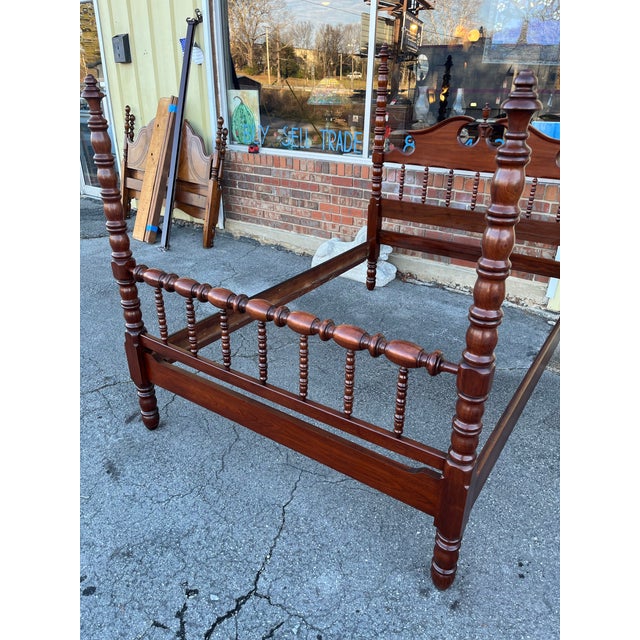 Vintage Davis Cabinet Co. full size bed in solid walnut. A very fine example of a spool turned poster bed with excellent...