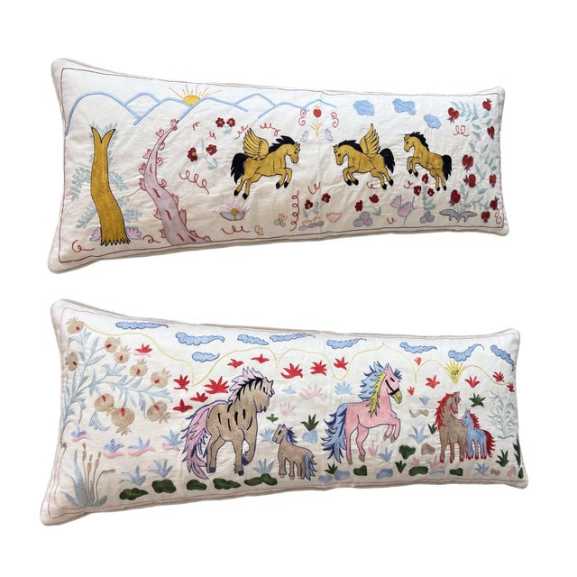 This beautiful 18'' x 52'' hand-embroidered Suzani pillow cover set was made from authentic Uzbek cotton fabric. The...