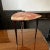 Elegant little tripod coffee or occasional table in red-tinted goatskin parchment and lacquer, created by the italian...