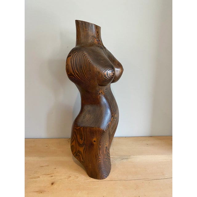 Fantastic sculpture of a female figure. Solid wood, polished
