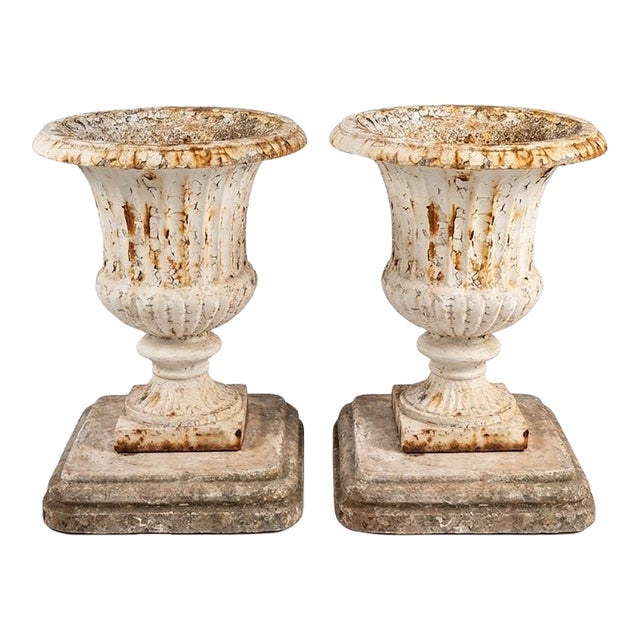 Pair of Vintage Cast Iron Campana Urns on Weathered Cast Stone Bases For Sale
