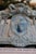 An elegant antique French centerpiece basket from the Faïencerie de Toul-Bellevue, bearing the impressed “FAÏENCERIE DE...