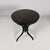 Italian Art Deco dining table in finely crafted black wood, 1930s Dining table in black wood. The round top features...