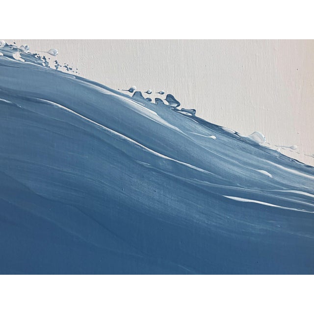 Bring timeless elegance and modern movement to your space with "Waves XVII" by JTS. This captivating abstract seascape...