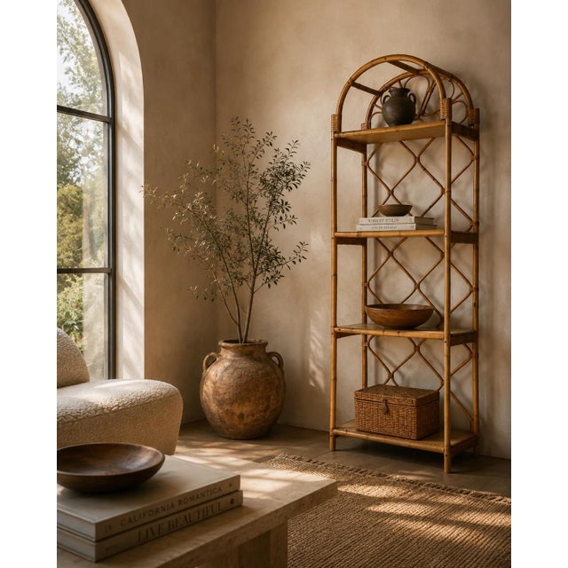 Bring effortless Coastal and Boho charm to your space with this vintage arched-top rattan étagère. Beautifully crafted...