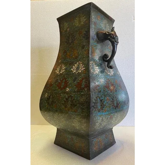 Superb quality Ming dynasty cloisonne vase with elephant head handles and vivid dynasty mark on the bottom. Ming dynasty...