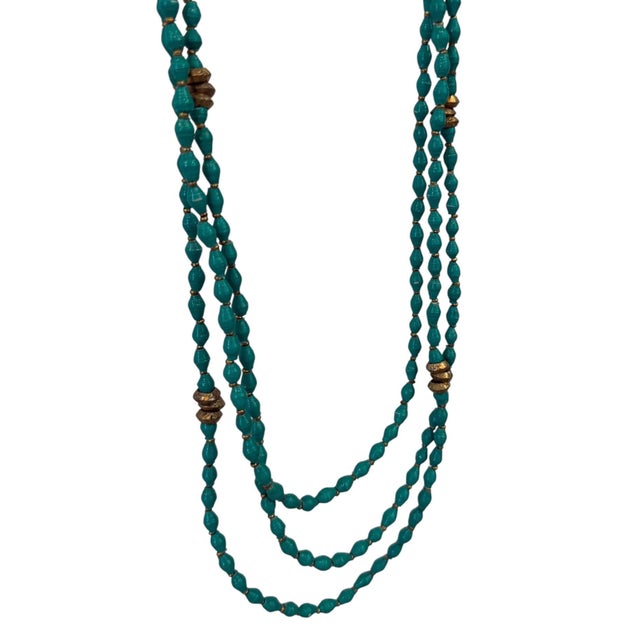 Great handmade paper beaded necklace with brass and gold painted beads toggle clasp.