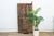 From the Awka region of northern Igbo territory in Nigeria, this monumental three-plank door represents a mgbo ezi, or...