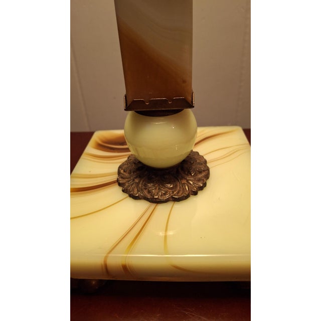 Elegant 1950’s Vintage Table Lamp carved out of pure Italian Onyx displaying rich tones of cream , carmel, & mild green...
