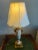 A gorgeous French Sevres Urn turned into table lamp from the 19th Century. Hand painted, woman sitting at a fountain and...