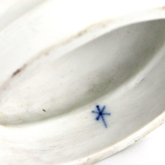 An elegant biscuit porcelain bust created by Charles Levy & Co in Charenton-le-Pont near Paris, representing a refined...