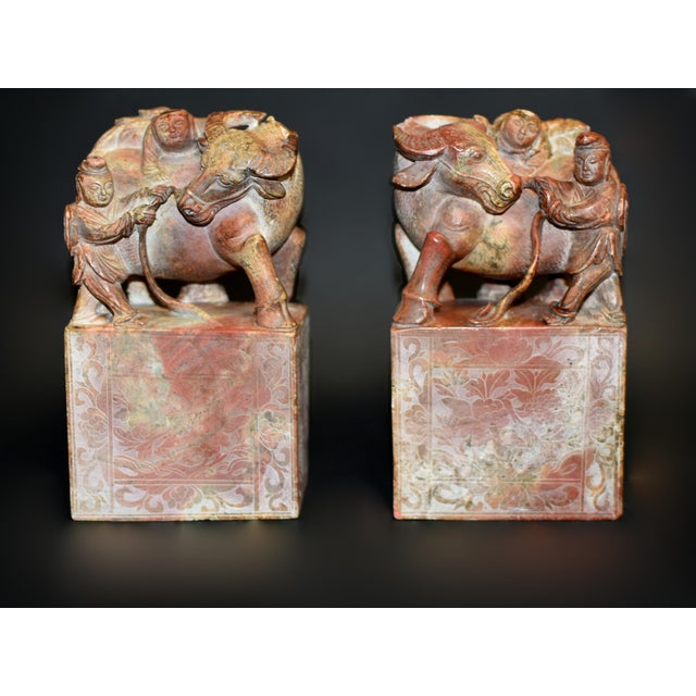 This large, remarkable pair of solid stone statues/bookends showcases masterful craftsmanship and artistry, each piece...