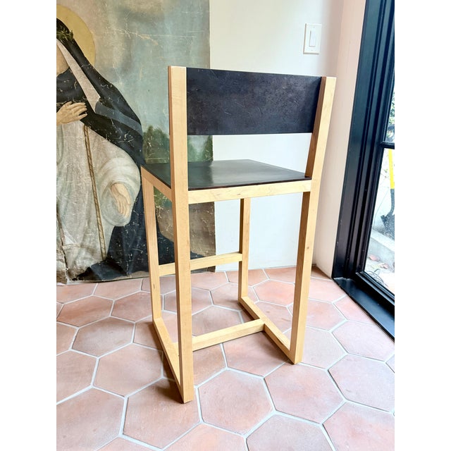 Tyler Hays's BDDW at its most pared back: the Square Guest Counter Stool in solid natural maple, with a seat and back in...