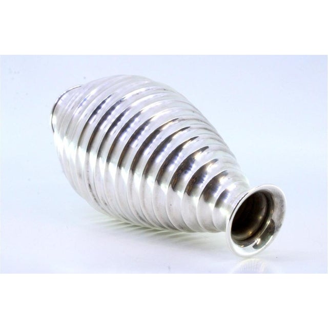 Honeycomb-Shaped Silver Jug with Circular Gradient Stripes, in Very Good conditions. Designed 1980 to 1989 This piece has...