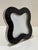A chic Jonathan Adler clover-shaped picture frame in glossy black enamel with polished silver-tone trim. This sculptural,...