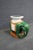Chinese ceramic elephant-form garden stool or side table, featuring a richly glazed green elephant with molded detailing...