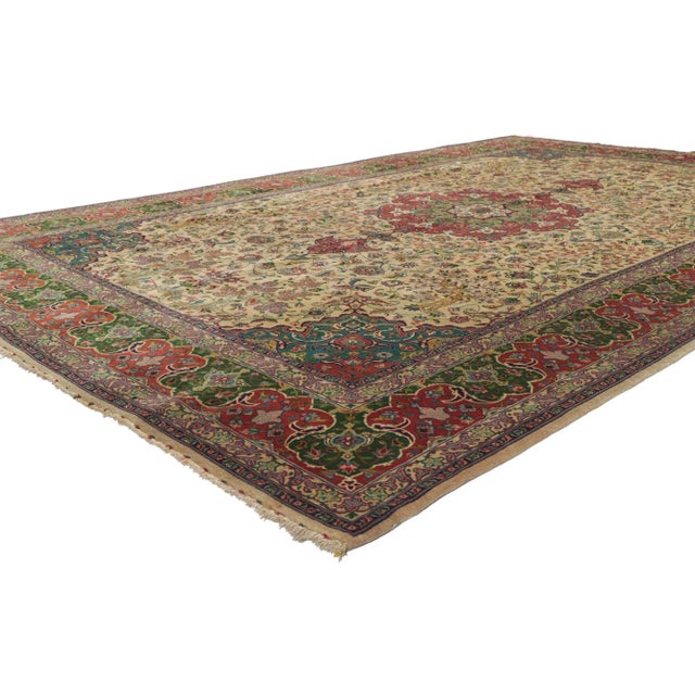 78170 Vintage Persian Tabriz rug, 06'06 x 10'05. With effortless beauty and ornate details, this hand-knotted wool vintage...