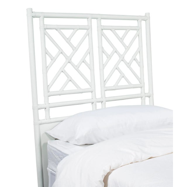This headboard features classic Rattan design in a geometric pattern. Constructed of solid rattan and hand bound with...