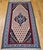 "A beautiful vintage Persian Senneh kilim area rug from the Kurdistan region of Western Persia, featuring a striking...