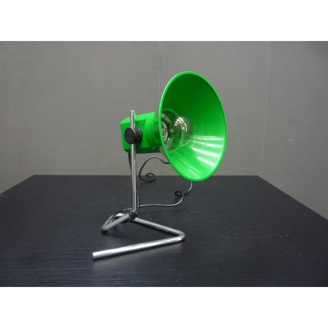 Very rare Guzzini table lamp in green. Excellent original condition and functional. Lampshade movable and height...