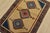 An authentic vintage tribal Yalameh rug hand-knotted with fine wool and natural dyes. This nomadic rug features geometric...