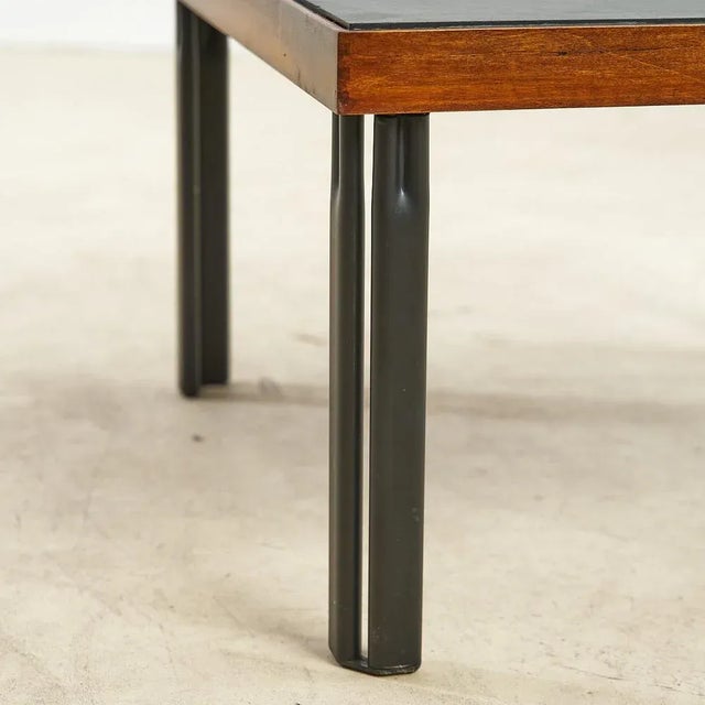 Living room table designed by Piero De Martini for Cassina, Naviglio model. Walnut, slate and lacquered metal. Height:...
