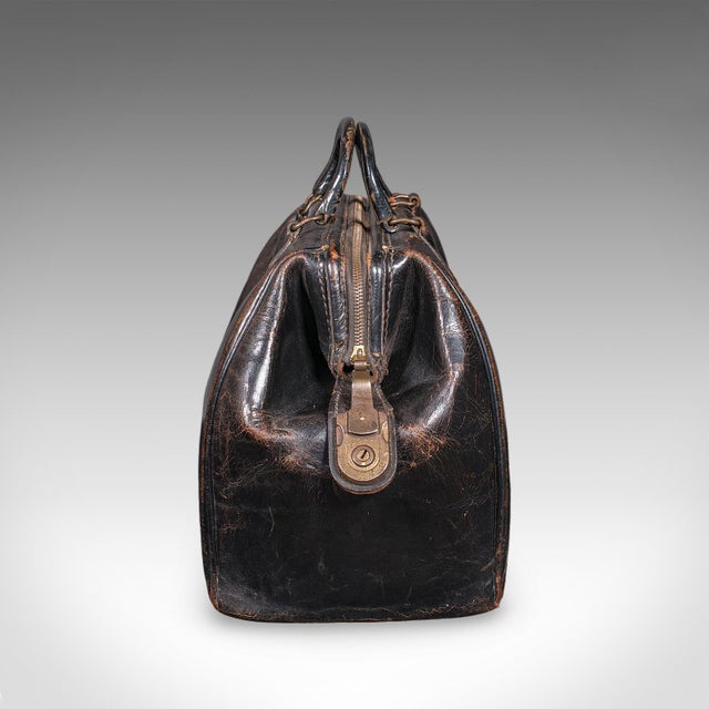 This is an antique railway director's Gladstone bag. An English, leather portmanteau case with railway interest, dating to...