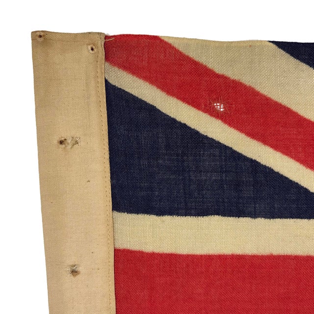 This vintage Australian Red Ensign flag is made from a sheer woolen cloth, with printed design visible on both sides....