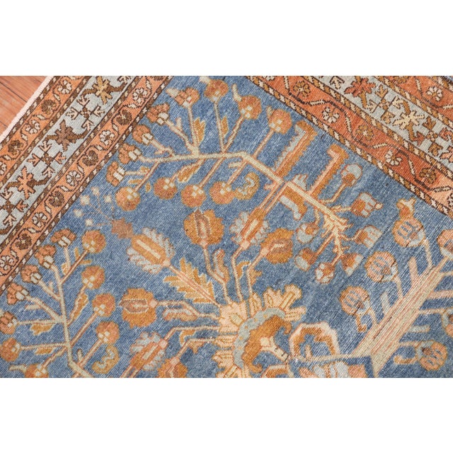 1930s Persian Lilihan in pretty blues and bronze tones Measures: 3'7'' x 4'11''.