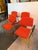 Design Plus Gallery presents a Set of Four Orange Modernist Arm Chairs from HighTower. The chairs are cloth wrapped in a...
