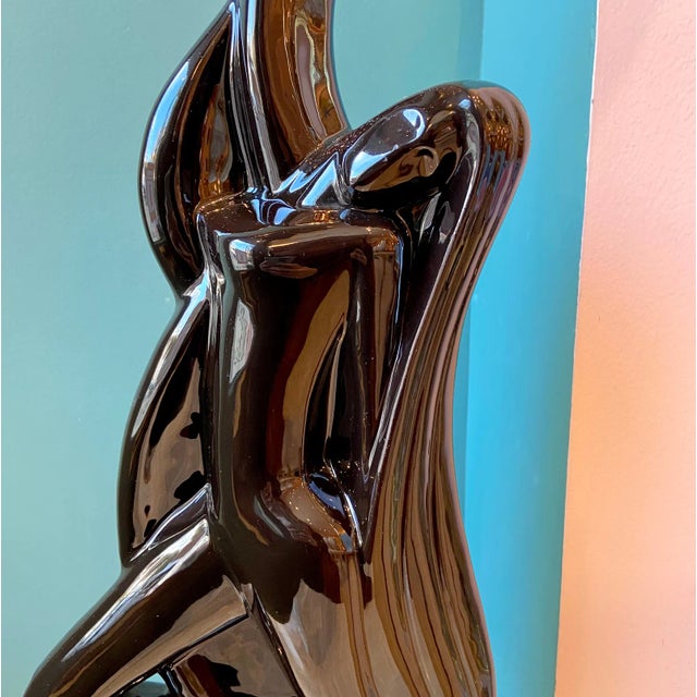 Striking glazed ceramic woman sculpture by Haeger, circa 1986. Condition: Excellent vintage condition, there is a painted...