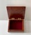 Beautiful lidded burl wood box. The box has a felt lining and measures about 4” x 5” x 2” high.