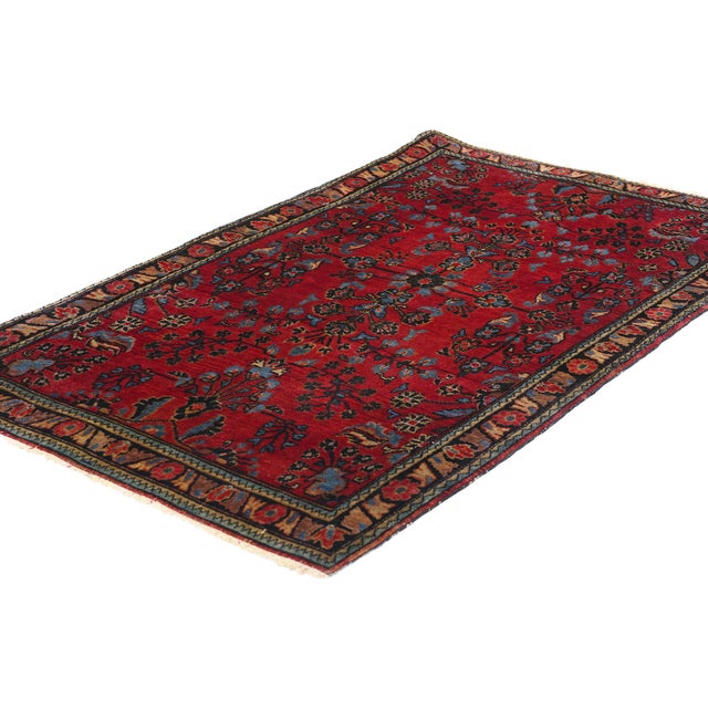 79010 Antique Red Persian Sarouk Rug, 02'03 x 03'10. This hand-knotted wool antique Persian Sarouk rug is a captivating...