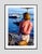 Riverside Gaze by Toni Frissell A woman gazes at passing boats from the deck of a Yacht, circa 1960. (Toni Frissell)...