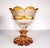 A rare German Bohemian crystal in chalice form. Dish has 8 petals on top with 7 etched engraved images of German historic...