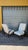 A stunning pair of mid-century modern armchairs, characterized by an elegant design, organic lines, and exceptional...