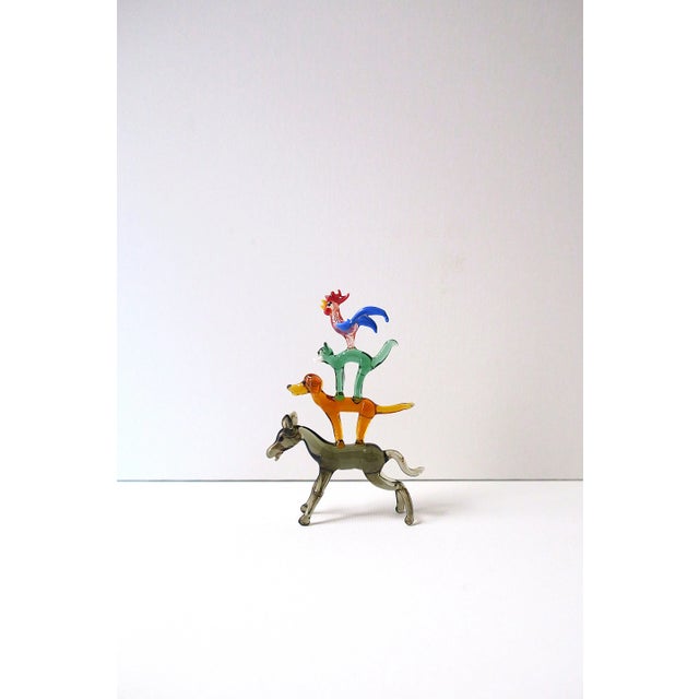 A beautiful art glass animal sculpture, Folk Art design, circa mid-20th century. Sculpture is hand-blown art glass of farm...