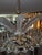 Beautiful! Complete, excellent condition, one down light, six within the chandelier and three in the crown of the light (8...