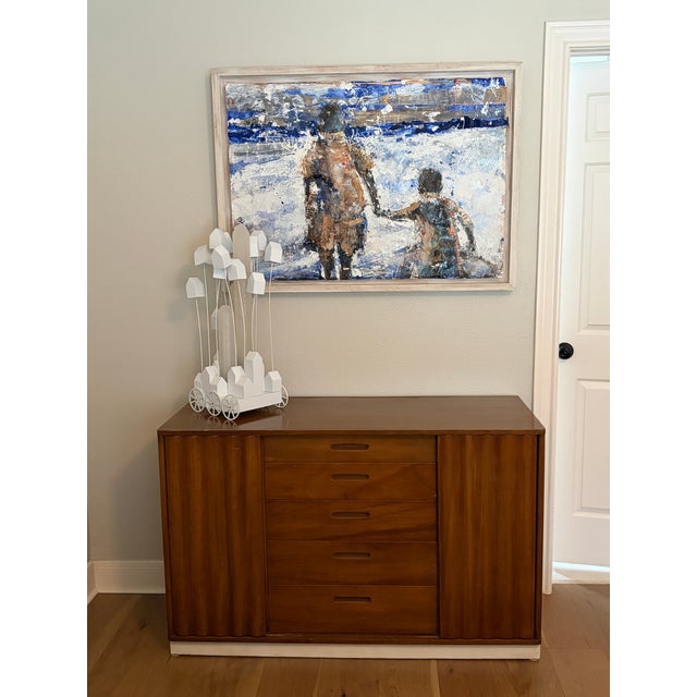 An exceptional mid-century modern credenza designed by Edward Wormley for Dunbar. This beautifully proportioned cabinet...