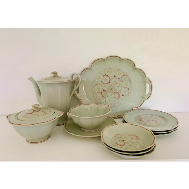 An exceptional curation of French Art Deco tableware from the historic 1928 collaboration between artist Suzanne Lalique...