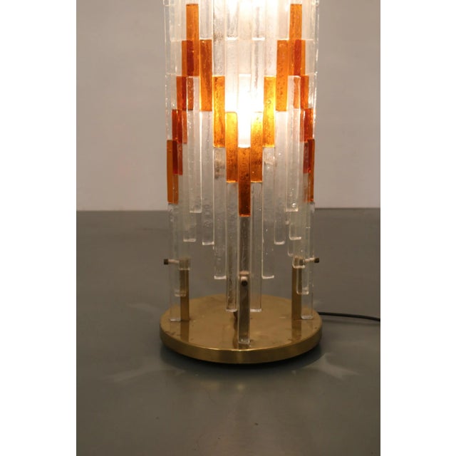 A beautiful, large glass floor lamp manufactured by Poliarte in Italy around 1960. This eye-catching piece is made of high...